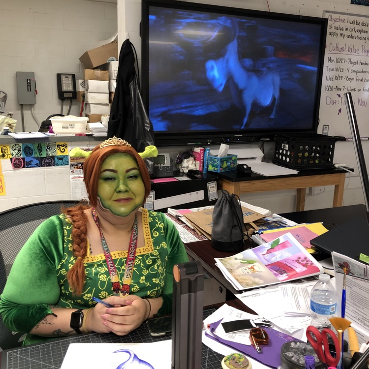 Princess Fiona running an activity for students.
