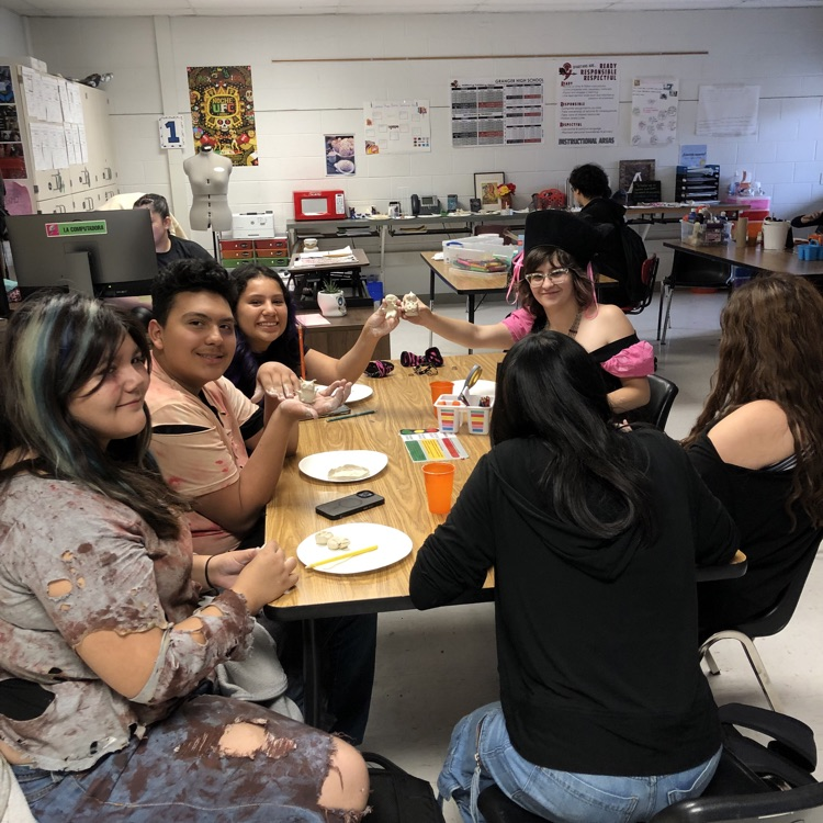 Making calaveras (sugar skulls)