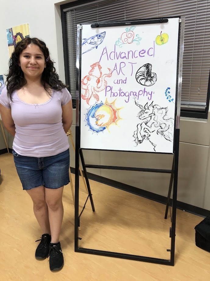 Camila Gonzalez-Lozano designed the welcome sign for GHS Art Club Exhibit