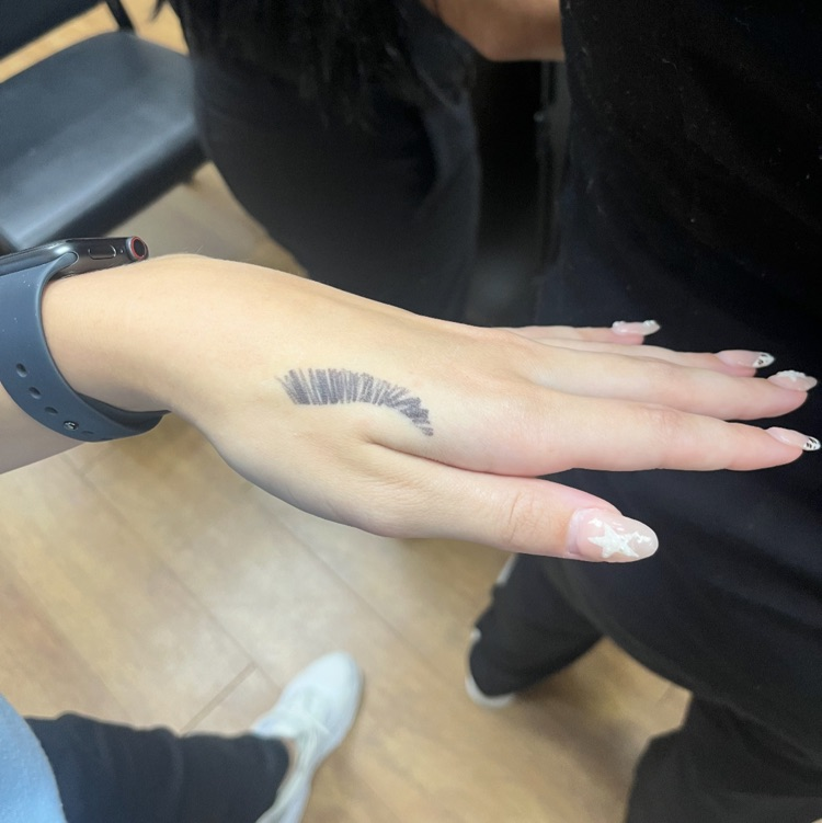 Cosmetology students practicing waxing!