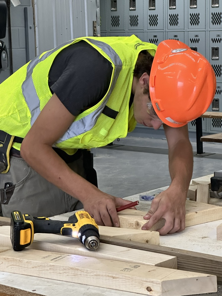 Students are using various tools to create their frames