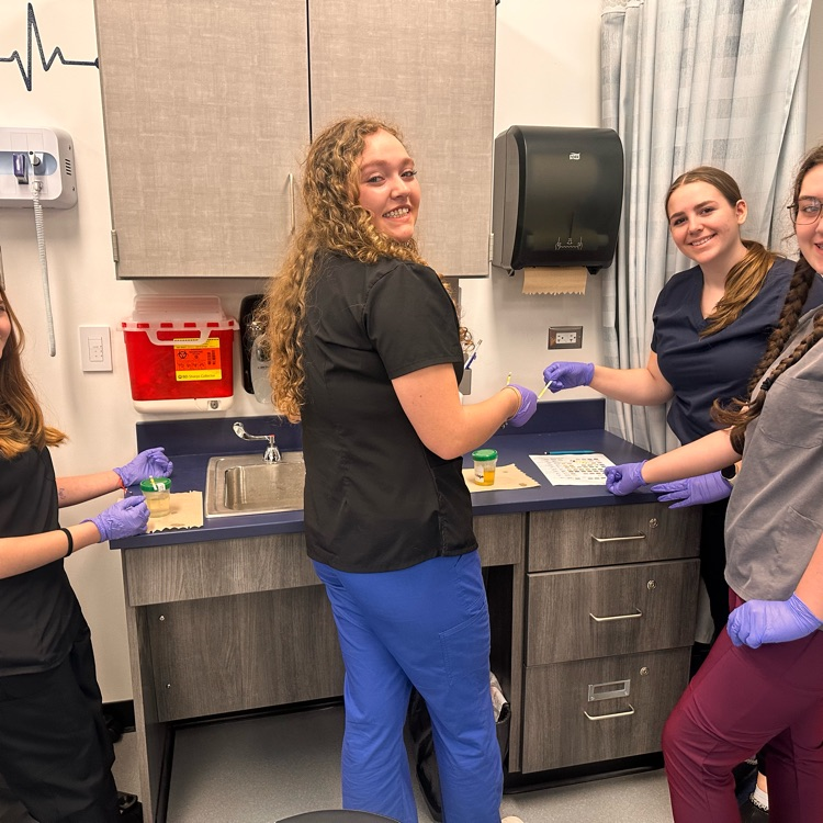 Juniors learning about testing urine