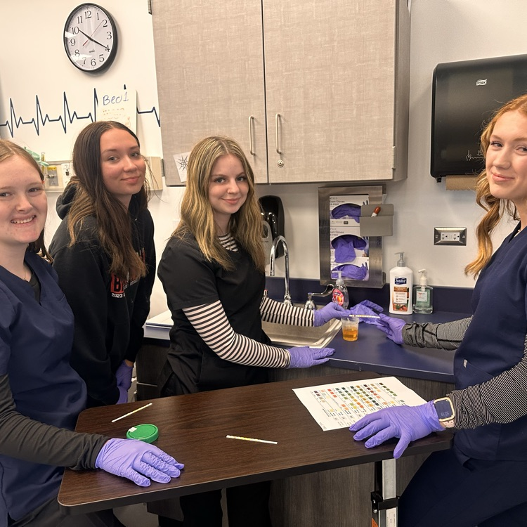 Juniors learning about testing urine