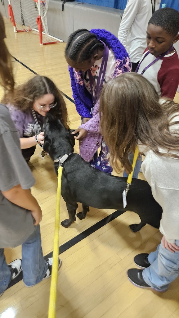 Theo meeting the staff and students.