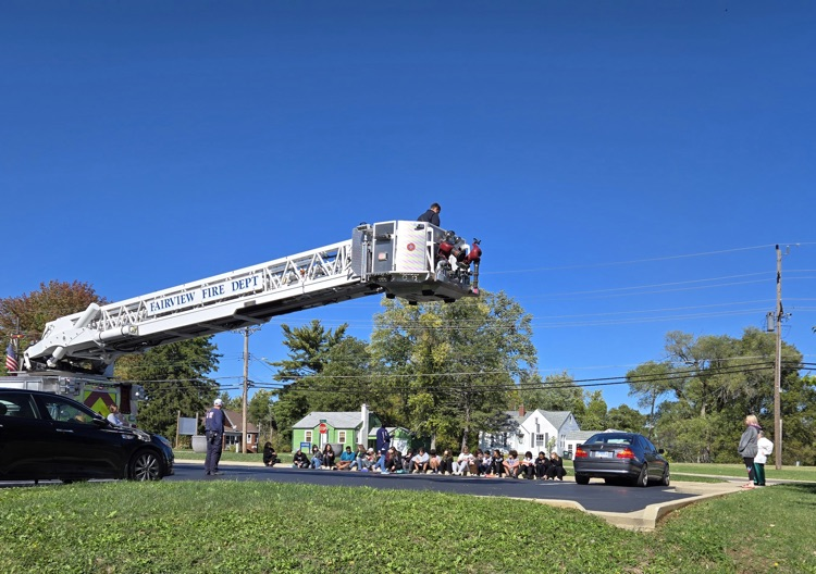 Fire truck = Mrs Huller doesn’t have to get on the roof.