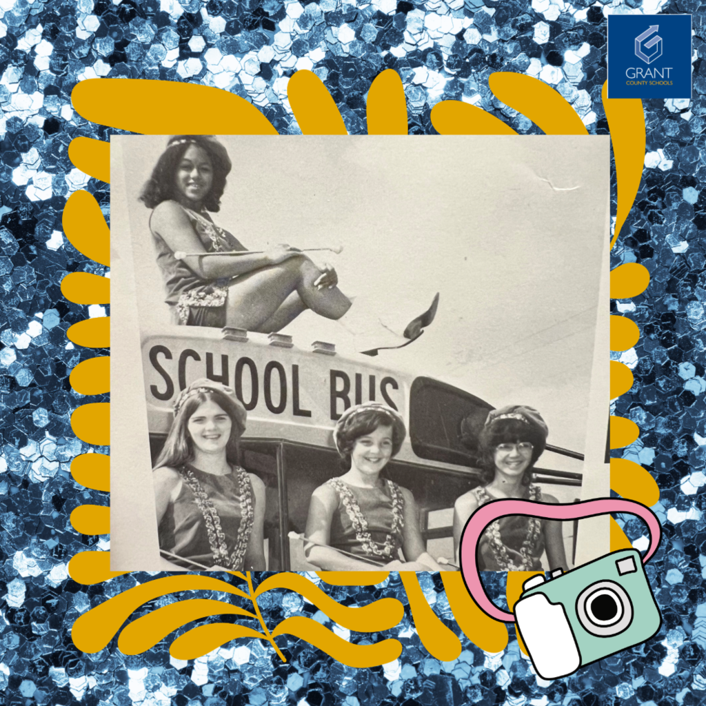 Vintage photo of girls sitting on a school bus
