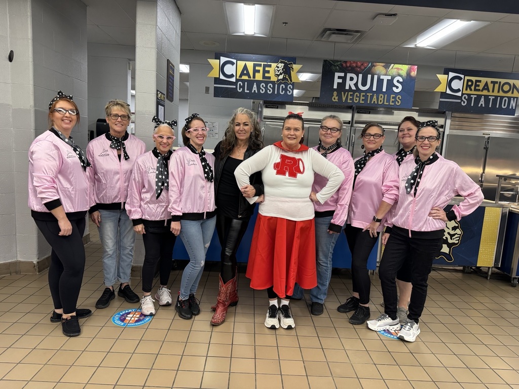 women dressed in pink and black