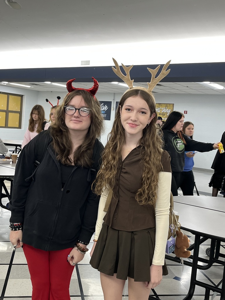 Girls dressed in black and brown