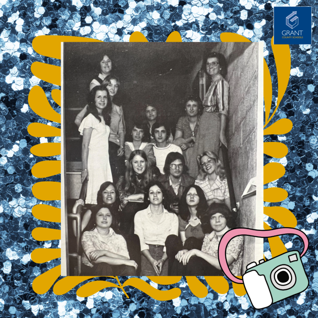 Vintage photo of students standing on stairs in a hallway