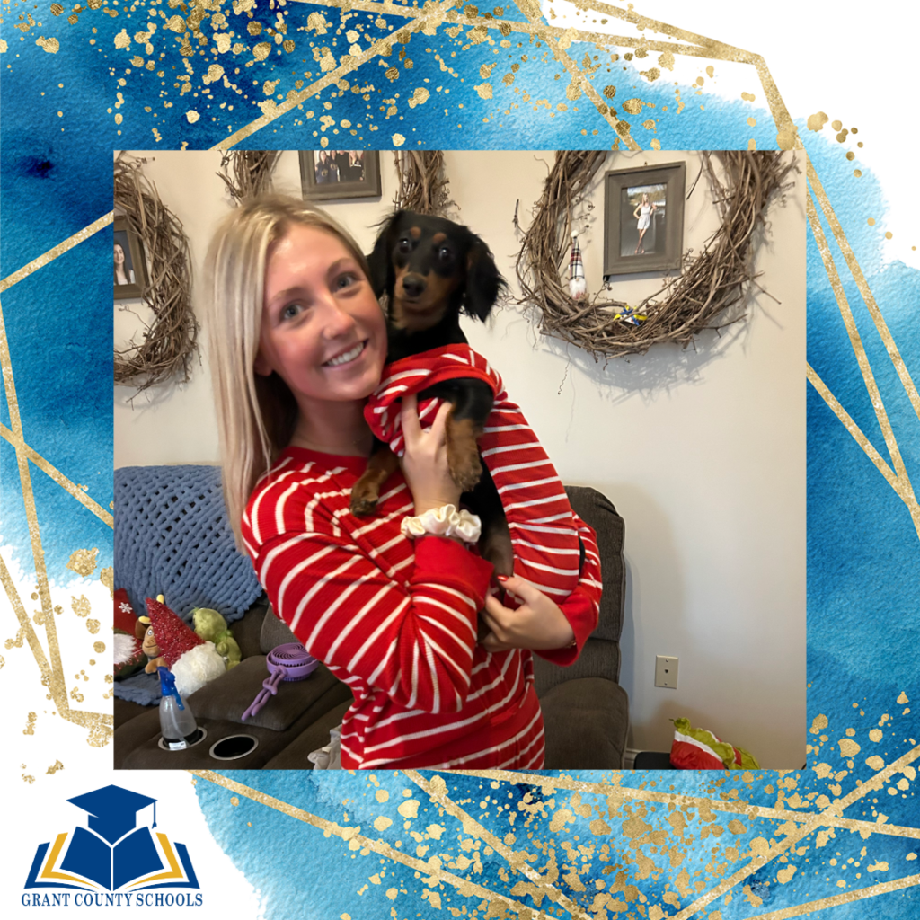 Girl red pajamas and dog in red pajamas