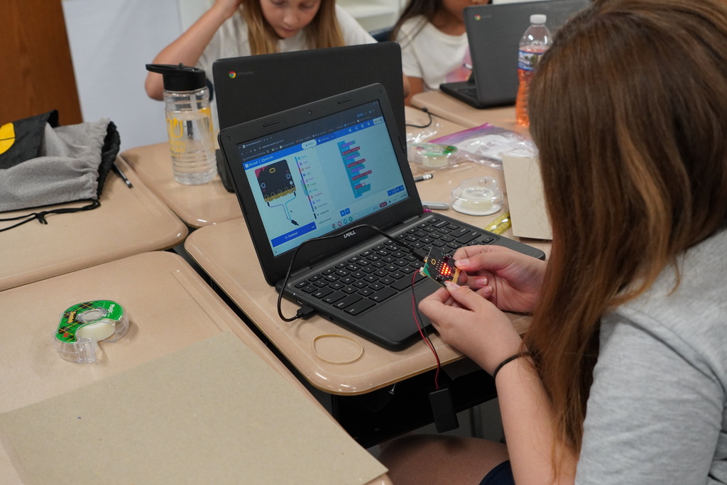student working on a code
