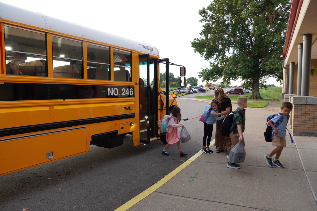 Students arriving off of a school bus