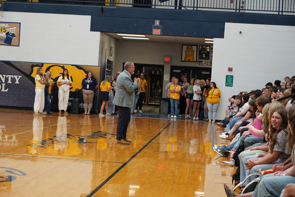 Man speaking to students