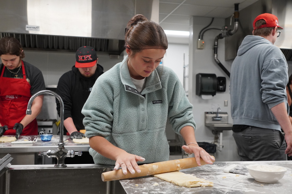 girl using a rolling pin
