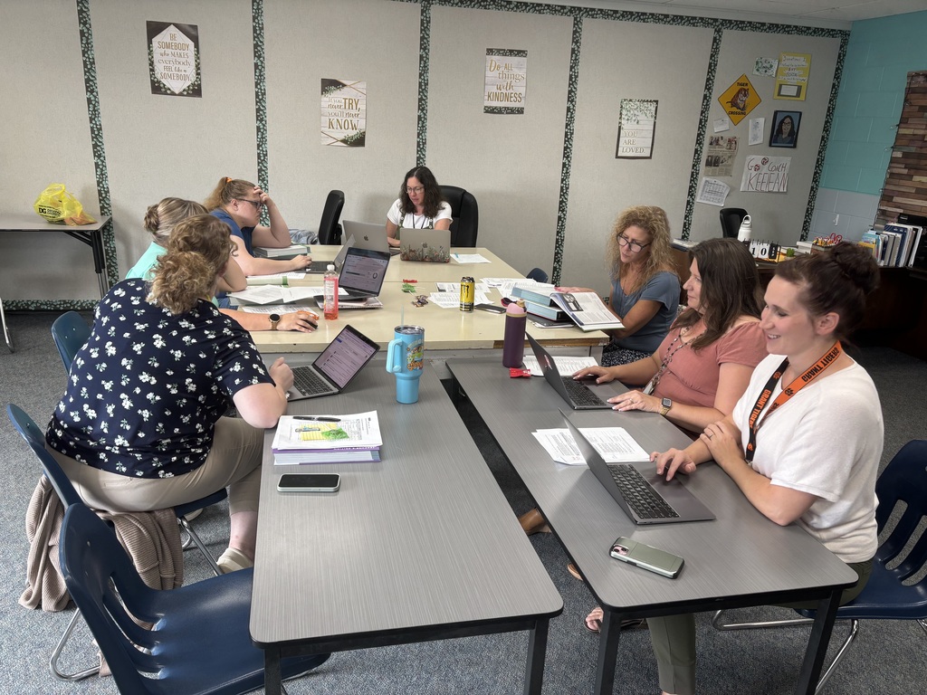 ELA staff digging through Savvas Curriculum!