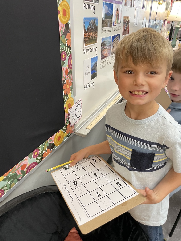 2nd Grade learns the Analog Clock