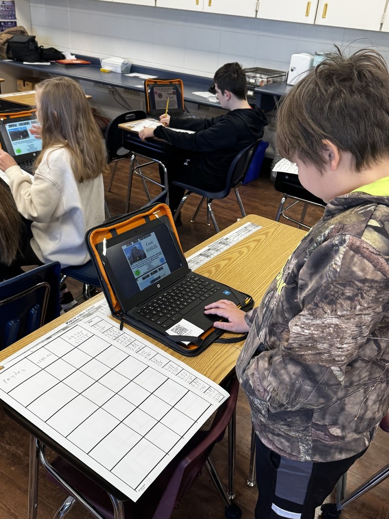 Grade 5 students studying real-world Math