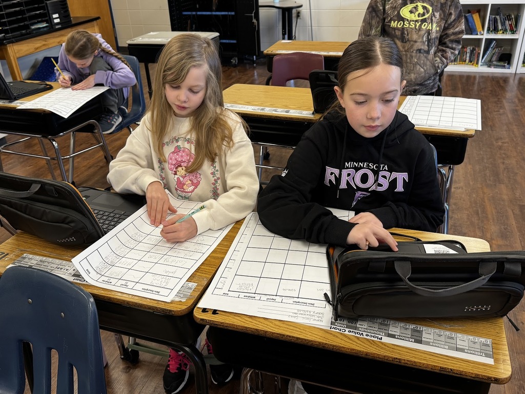 Grade 5 studying decimals in a Game of Life