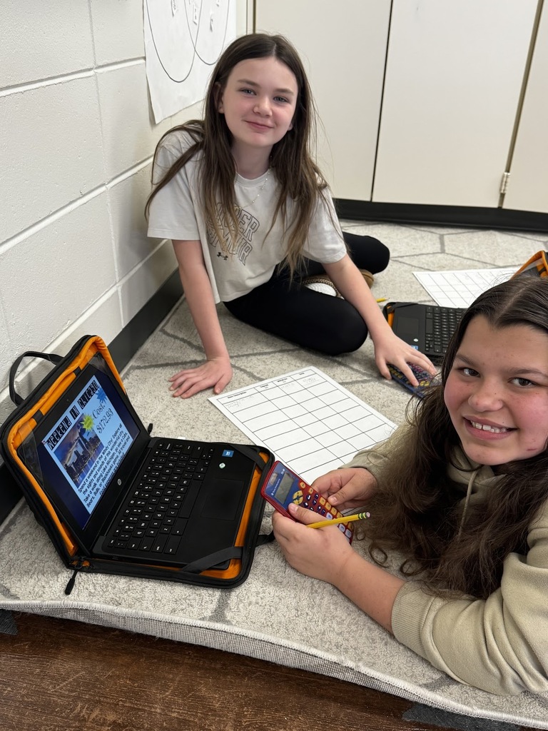Grade 5 studying decimals in a Game of Life