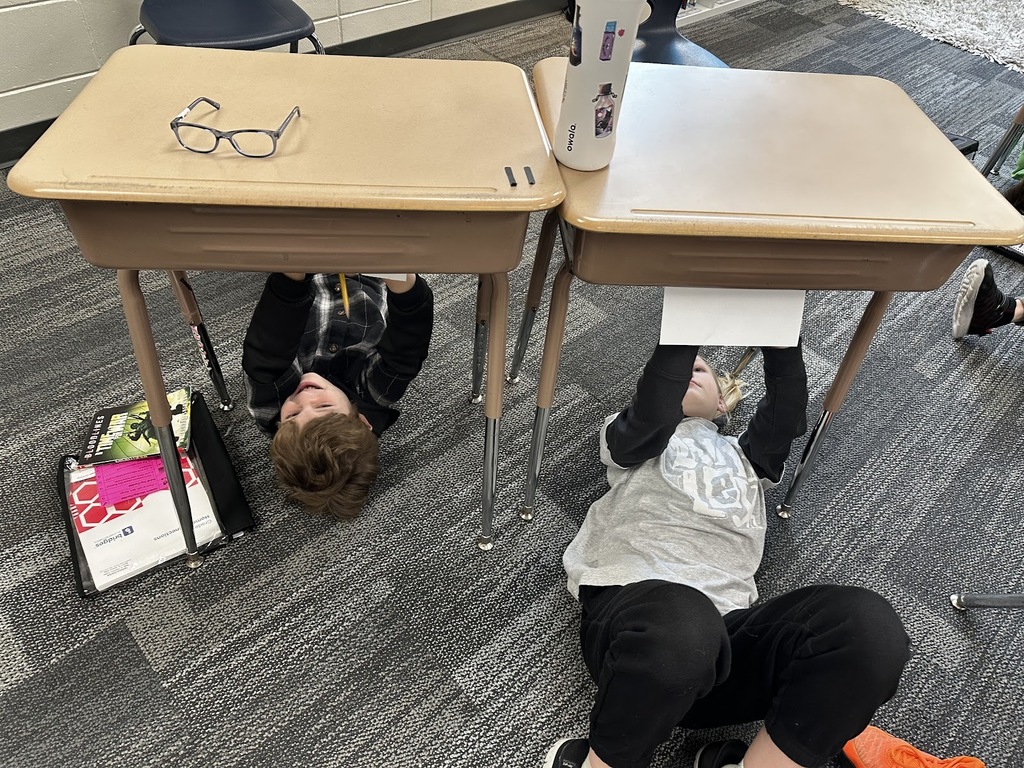 GMS Students painting self portraits like Michaelangelo!