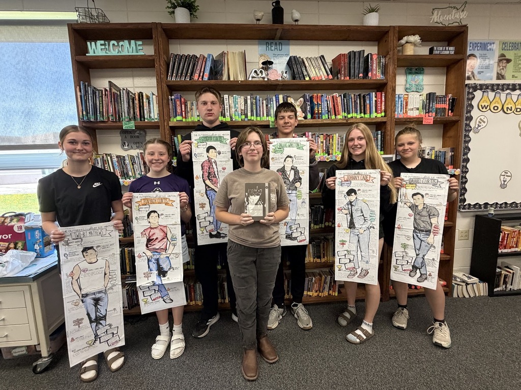photo of grade 8 outsiders caricautres of favorite characters