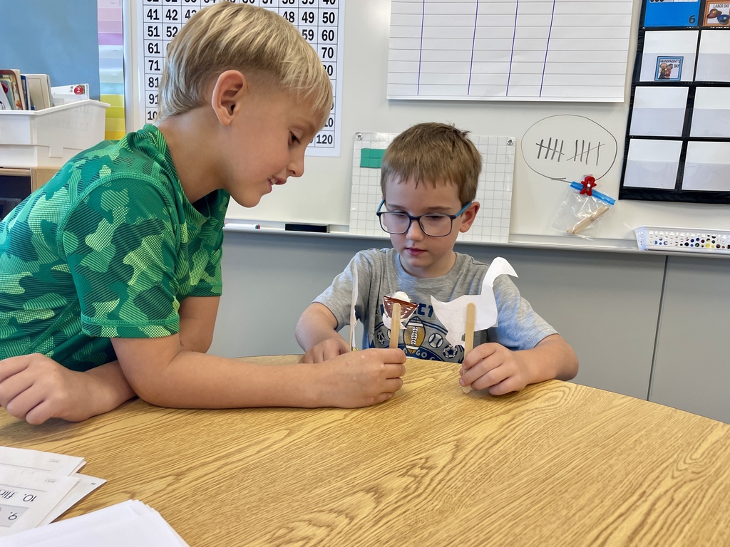 1st Grade Students create fables with their stick puppets.