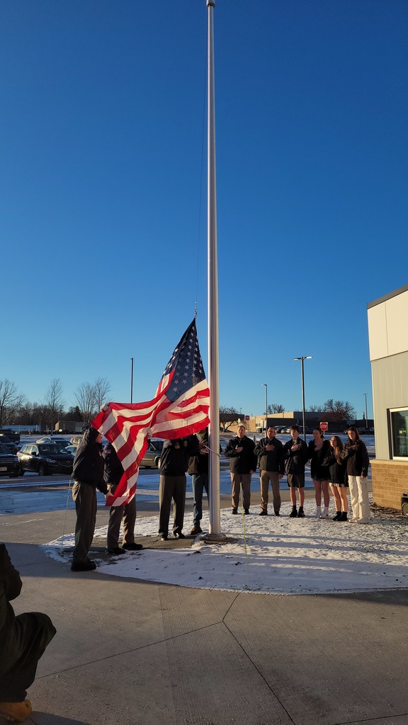 Flag being raised