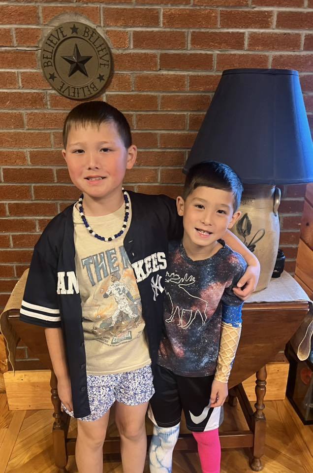 Two boys dressed up for mismatch day