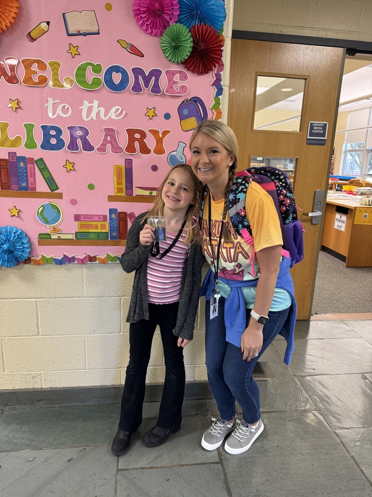 Principal Taylor dressed as a student and a student dressed like Mrs. Taylor