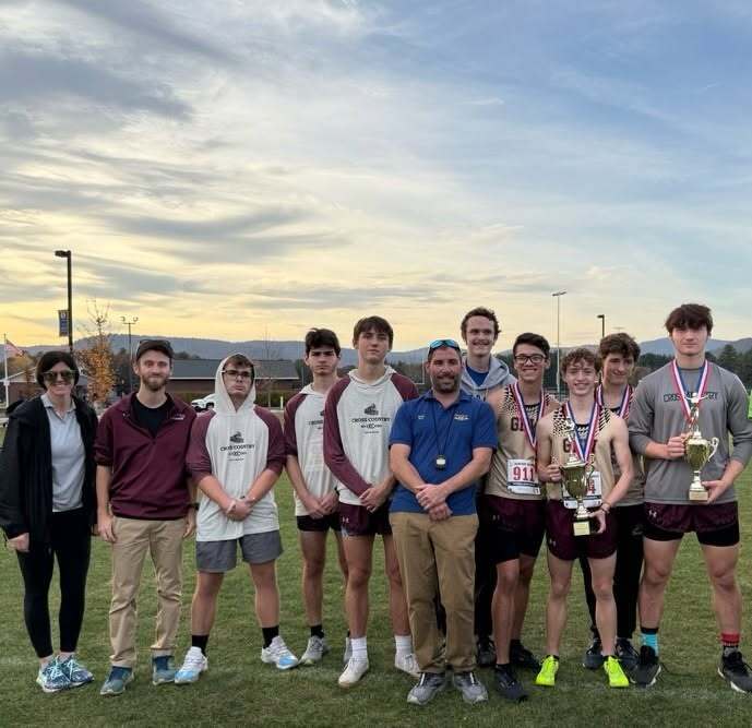 An oldie but a goodie - Coach Best with the Varsity Track Team 2024