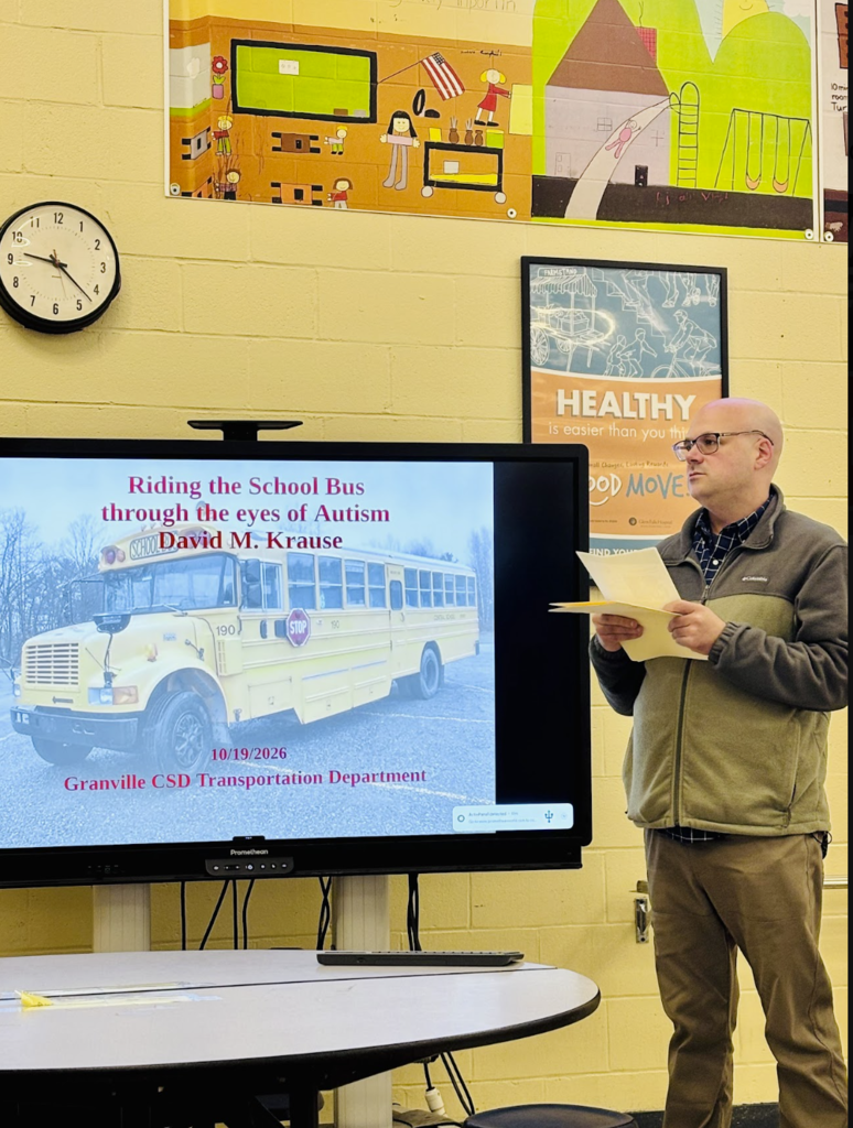 Mr. Krause speaks to transportation team about bus safety through the eyes of autism. 