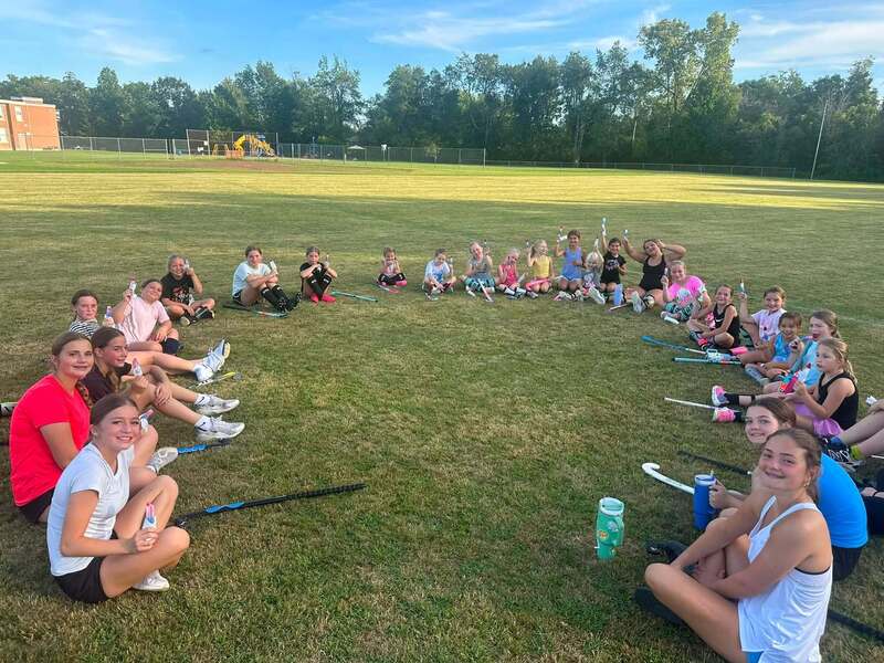 Youth Field Hockey program and their high school mentors