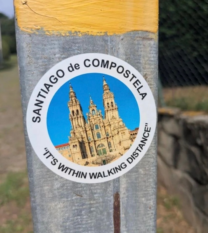 Mr. Ward's picture - Camino Trail sticker on wood fence post