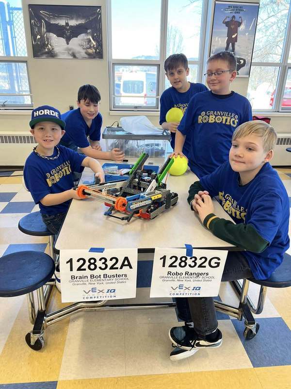 Vex competition Feb 2025 - image of five boys in blue wearing Granville CSD VEX club t-shirts