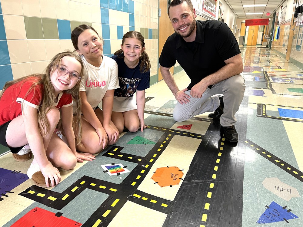 Teacher with students