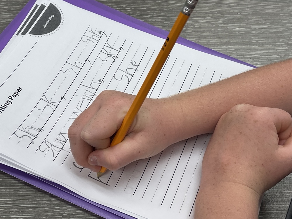 Student working on writing