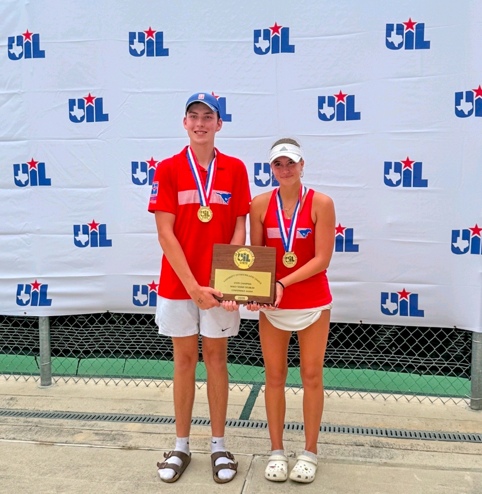 Sara and Noah posing with state championship trophy