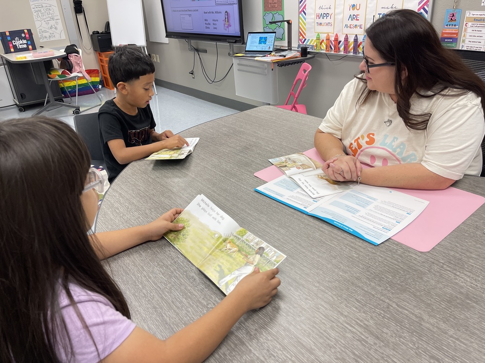Teacher with students