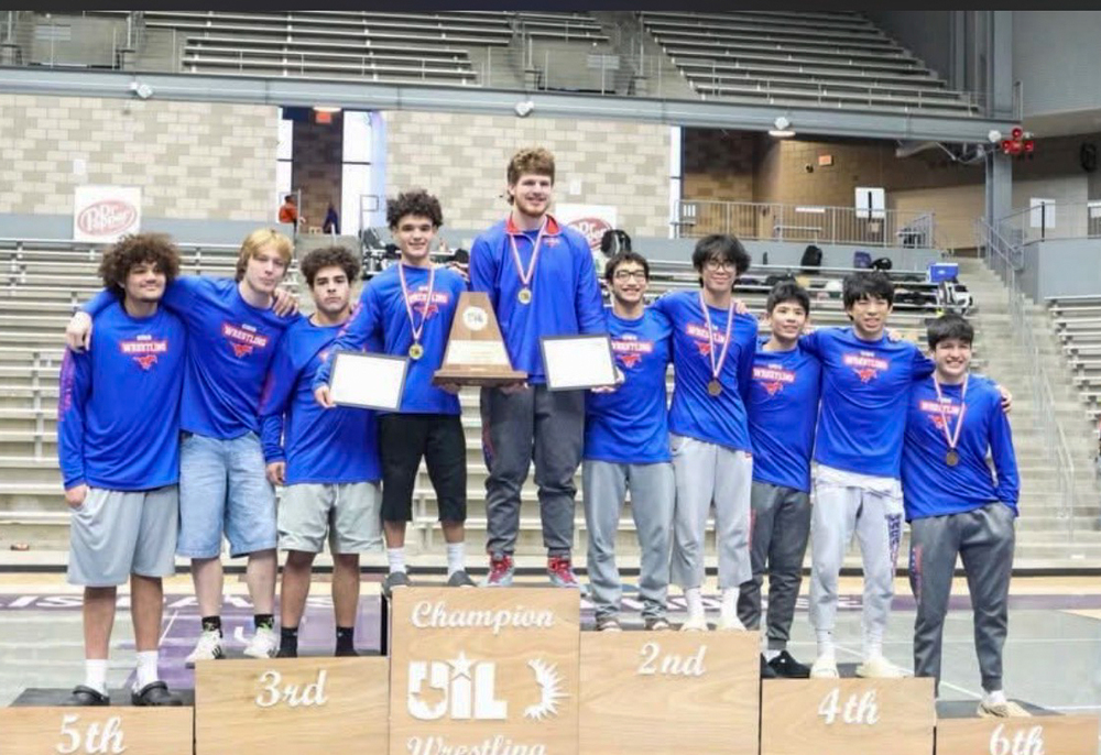 Grapevine High School Wrestling Team Standing on Podium