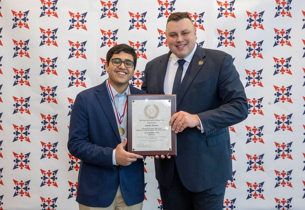 Student Daniel Thomas receiving award