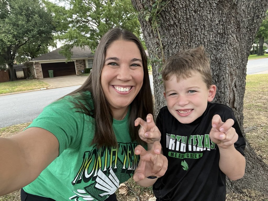 Parent and student wearing college gear