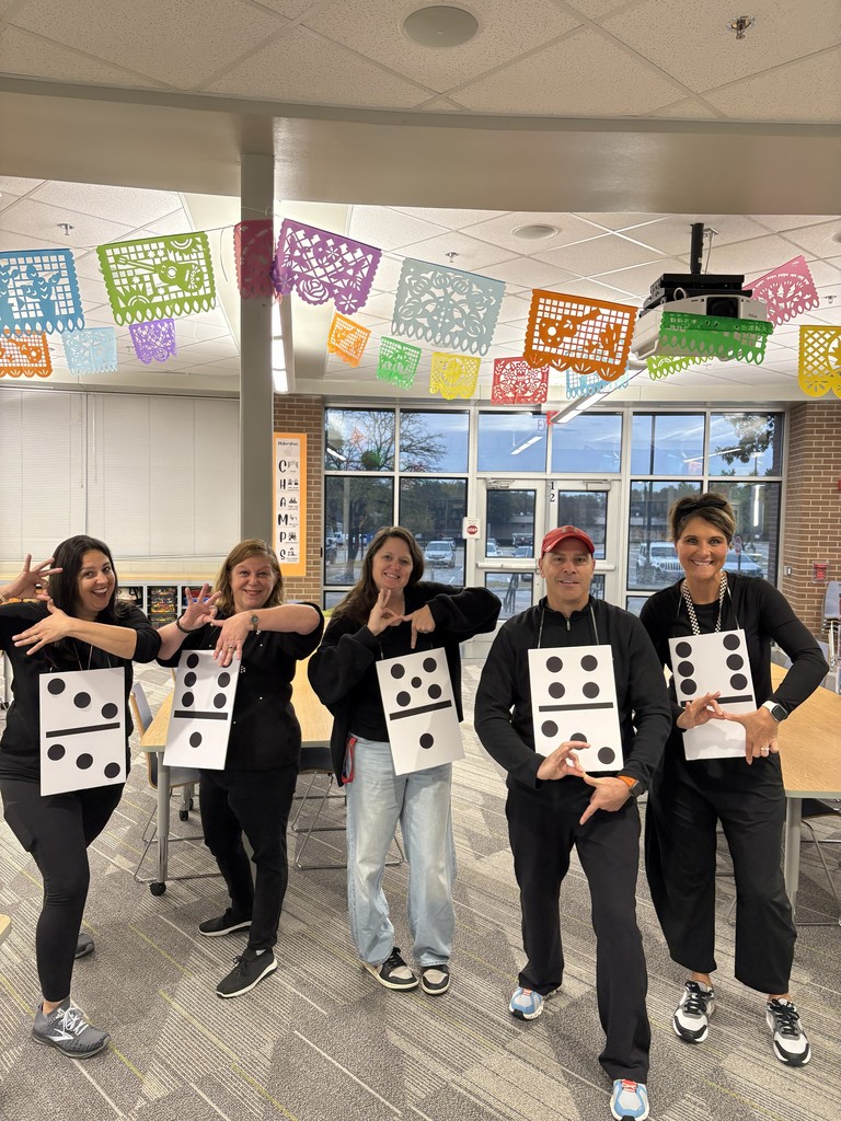 The specials teachers wear dominoes adding to 6 or 7 and make a 6-7 hand sign