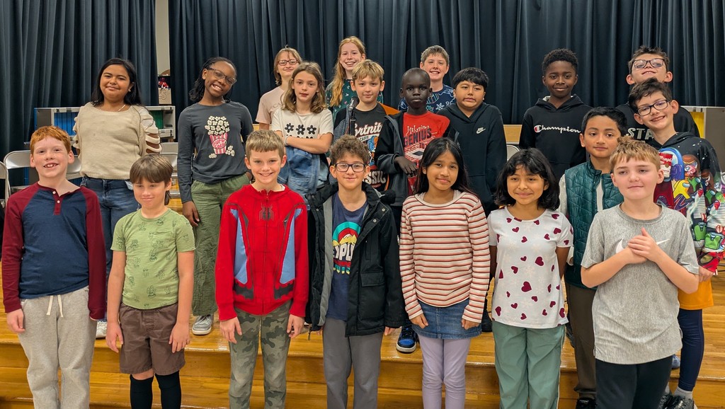 The spelling bee contestants pose for a picture.