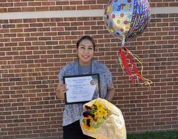 Teacher of the Year, Mrs Dagger and Paraprofesiional of the Year, Mrs Ana Medrano