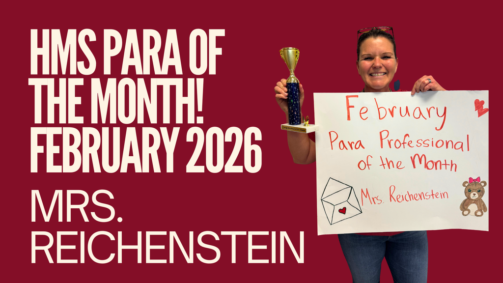 Mrs. Reichenstein holding a Para of the Month poster