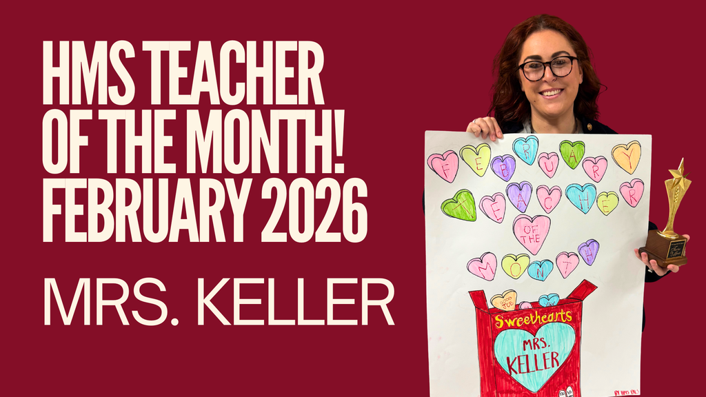 Mrs. Keller holding a Teacher of the Month poster