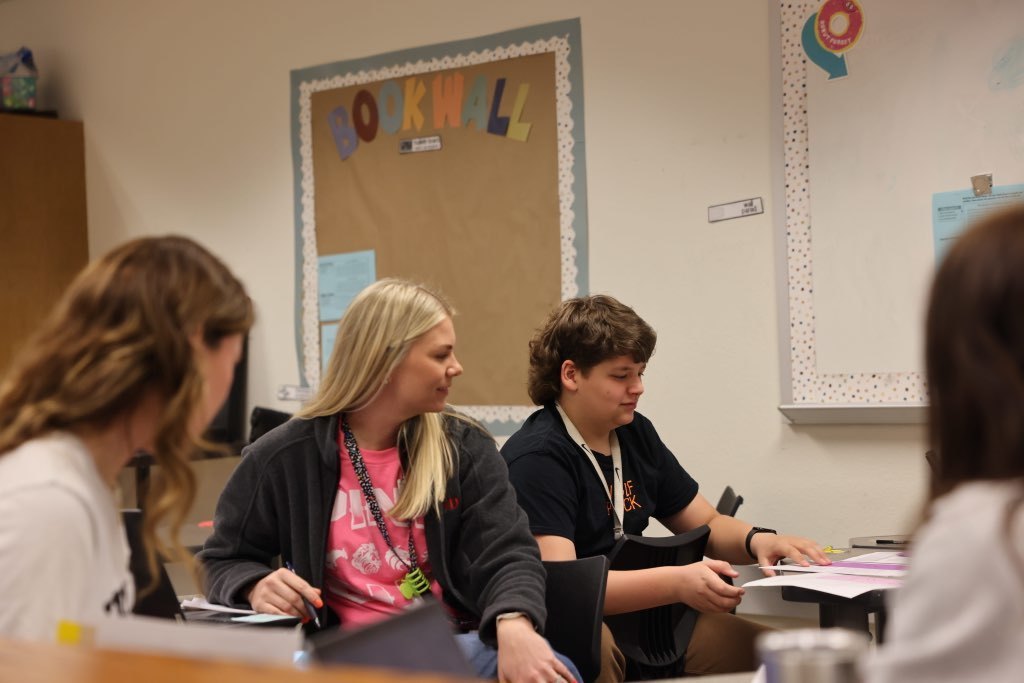 student sitting in a meeting