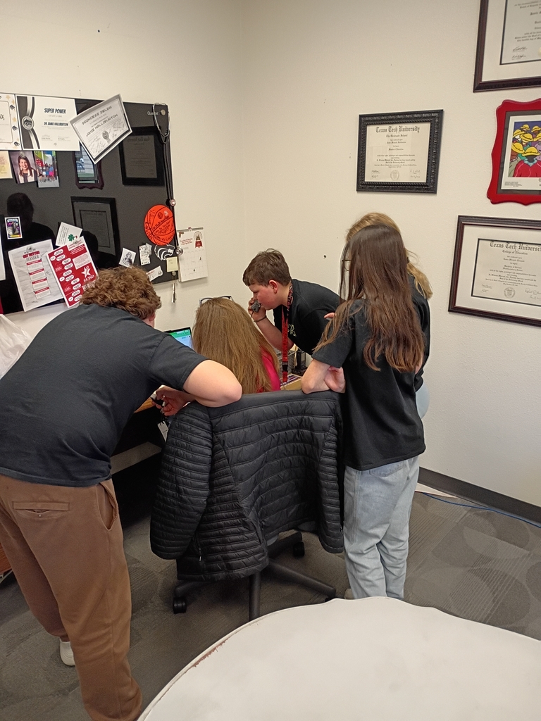 students helping with announcements