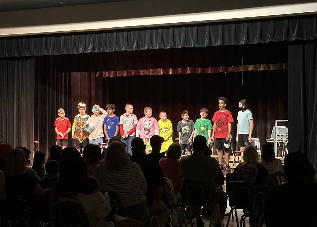 Theater 1 group photo on stage