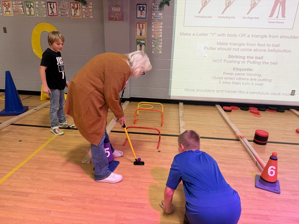Dove Elementary students working on TEKS "striking unit" with a mini golf course